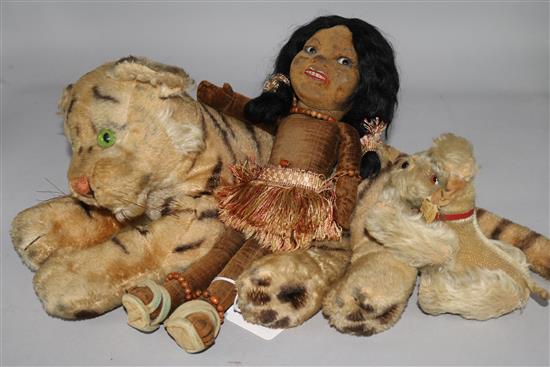 A Steiff tiger, a Steiff dog and a doll